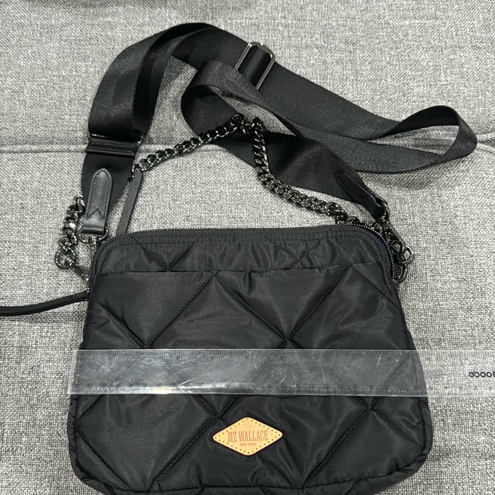 MZ Wallace black quilted crossbody bag with blue interior